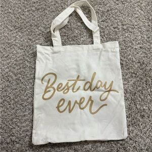 Stylish Cream Tote Bag with Gold Accents